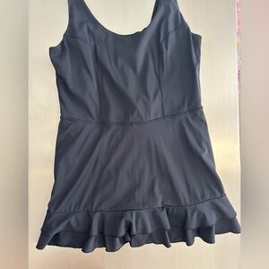 Athletic dress with ruffle details and built in shorts